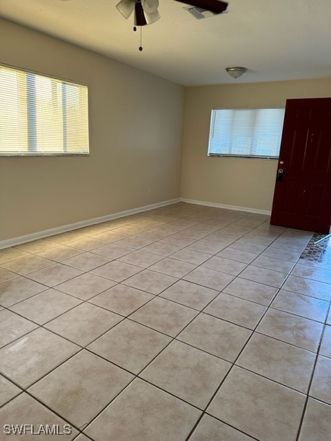 3215 Skyline Boulevard, Unit C Cape Coral, FL 33914 - Photo 25 of 25 an empty room with windows