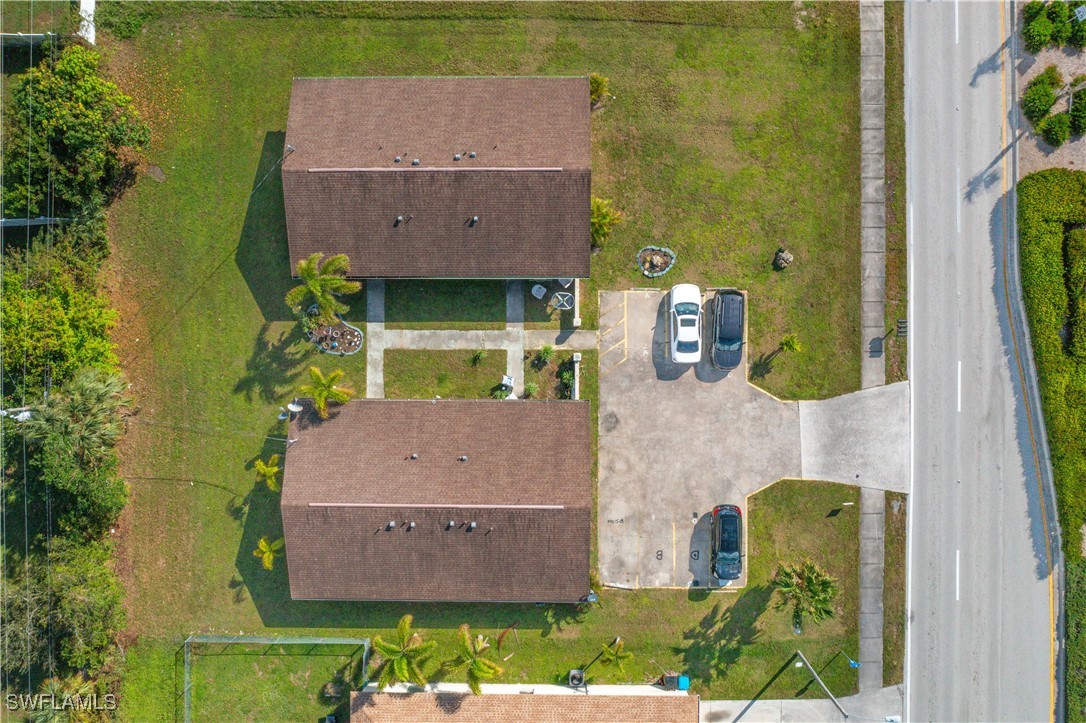 3215 Skyline Boulevard, Unit C Cape Coral, FL 33914 - Photo 7 of 25 an aerial view of a house with a swimming pool