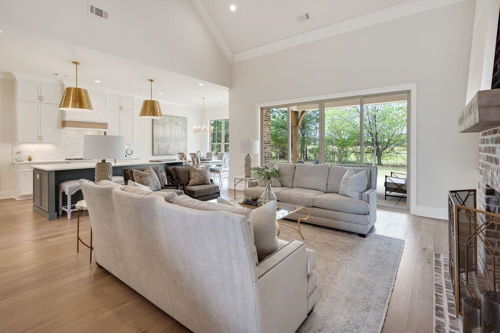 597 Cedar Shadows Circle West Collierville, TN 38017 - Photo 11 of 36 a living room with furniture and a large window
