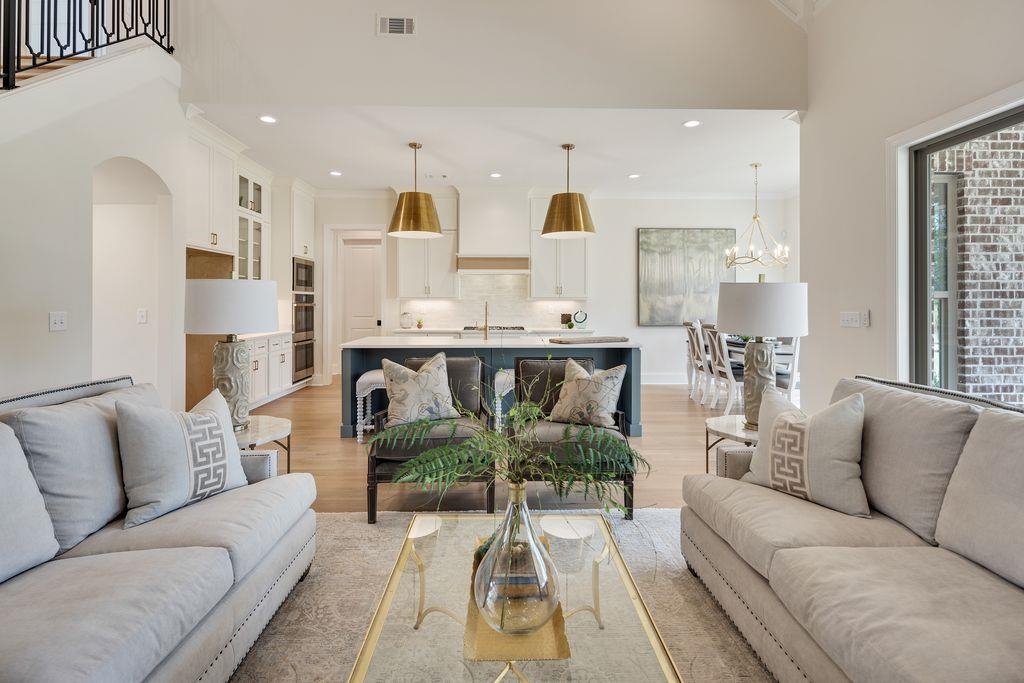 597 Cedar Shadows Circle West Collierville, TN 38017 - Photo 13 of 36 a living room with furniture white walls and white walls