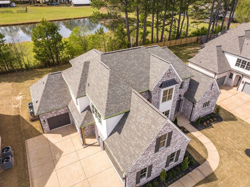 597 Cedar Shadows Circle West Collierville, TN 38017 - Photo 3 of 36 an aerial view of a house with swimming pool and sitting area