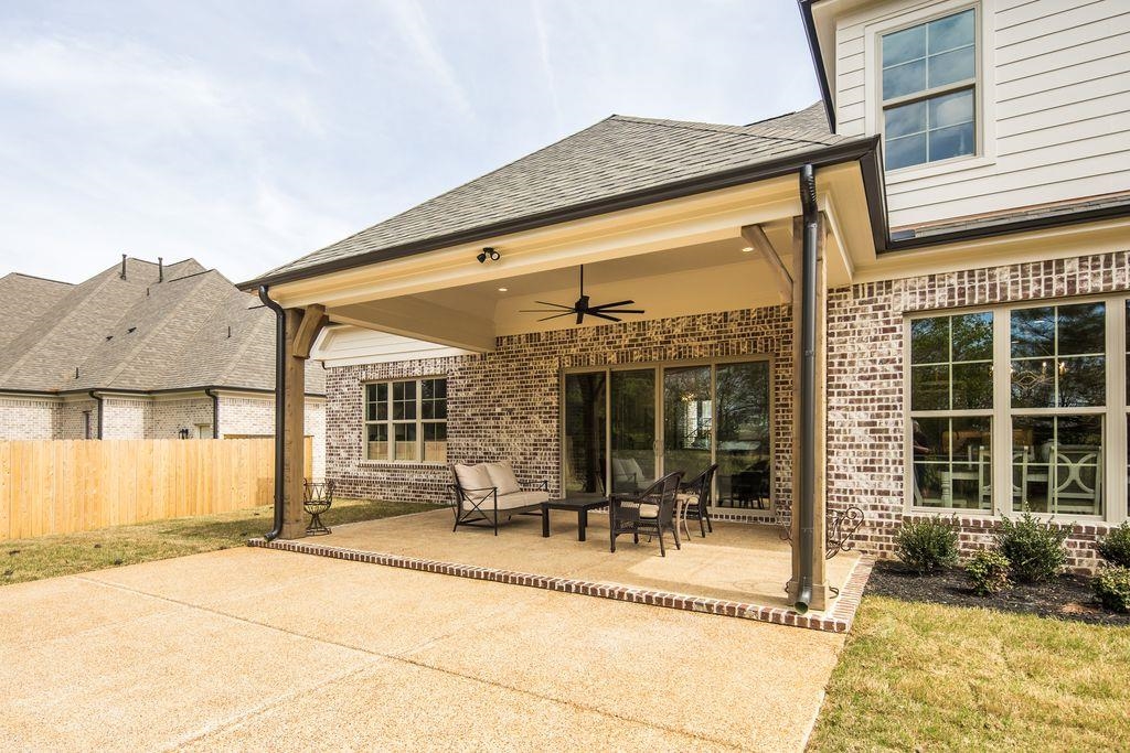 597 Cedar Shadows Circle West Collierville, TN 38017 - Photo 33 of 36 a view of a house with a patio