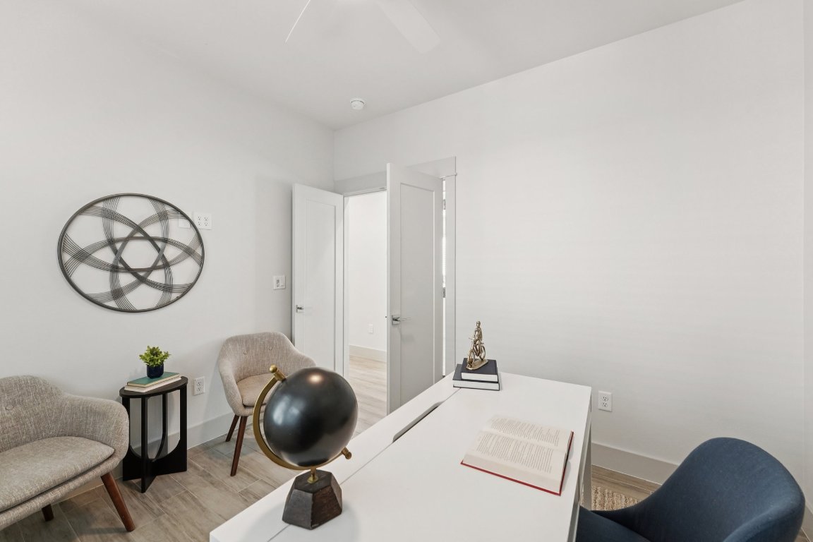 3711 Cedar Street Austin, TX 78705 - Photo 19 of 40 a room with a table and a chair