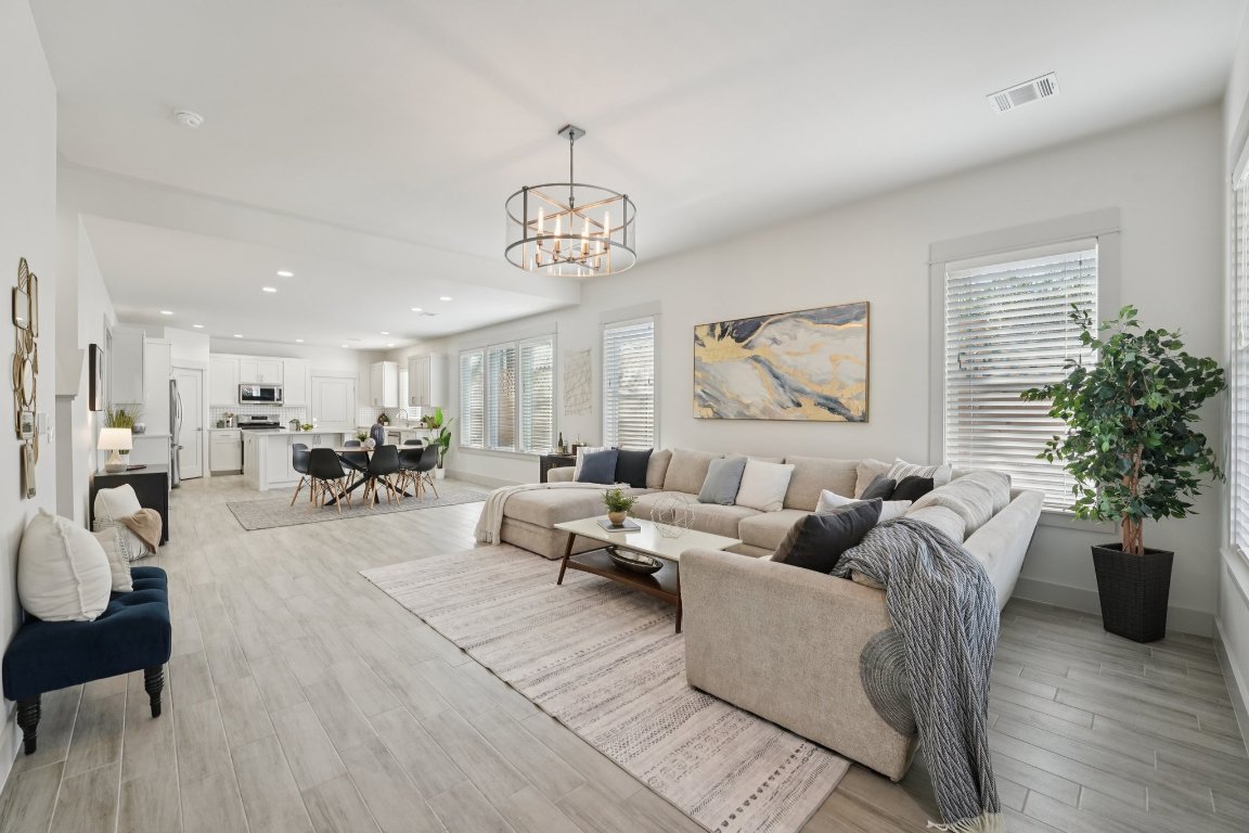 3711 Cedar Street Austin, TX 78705 - Photo 2 of 40 a living room with furniture potted plant and a window