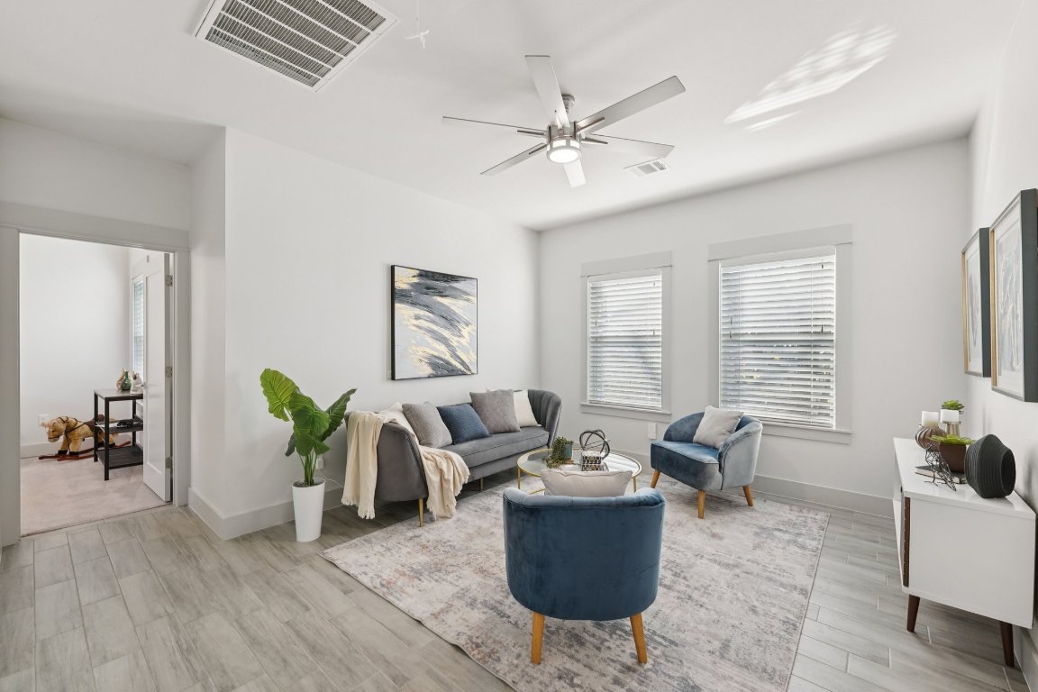 3711 Cedar Street Austin, TX 78705 - Photo 22 of 40 a living room with furniture and wooden floor
