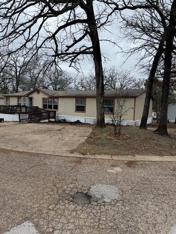 2525 Shiloh Road, Unit 240 Tyler, TX 75703 - Photo 1 of 18 a view of a yard with a tree