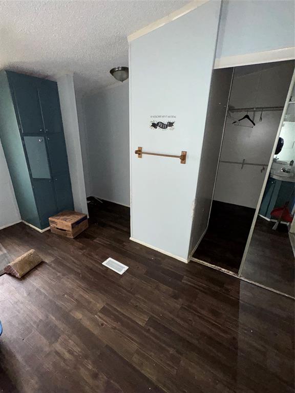 2525 Shiloh Road, Unit 240 Tyler, TX 75703 - Photo 15 of 18 an empty room with wooden floor