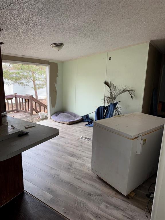 2525 Shiloh Road, Unit 240 Tyler, TX 75703 - Photo 8 of 18 a living room with furniture and a flat screen tv