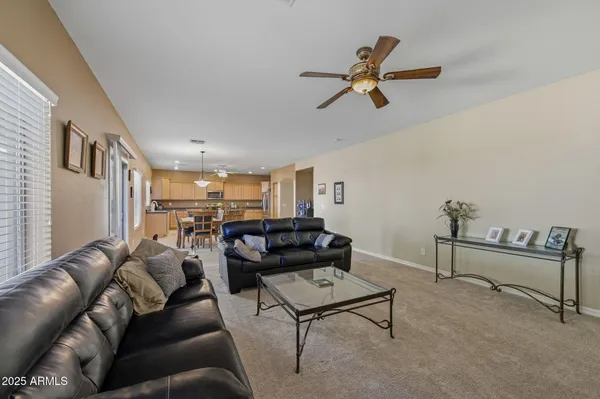 a living room with furniture and a window