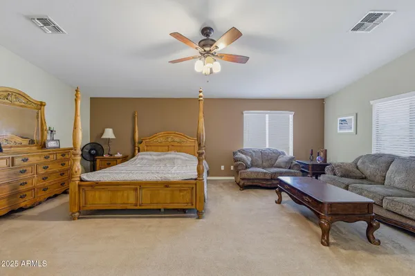 a bathroom with a sink a bathtub and a mirror
