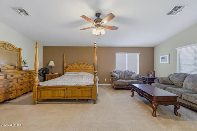 a bathroom with a sink a bathtub and a mirror
