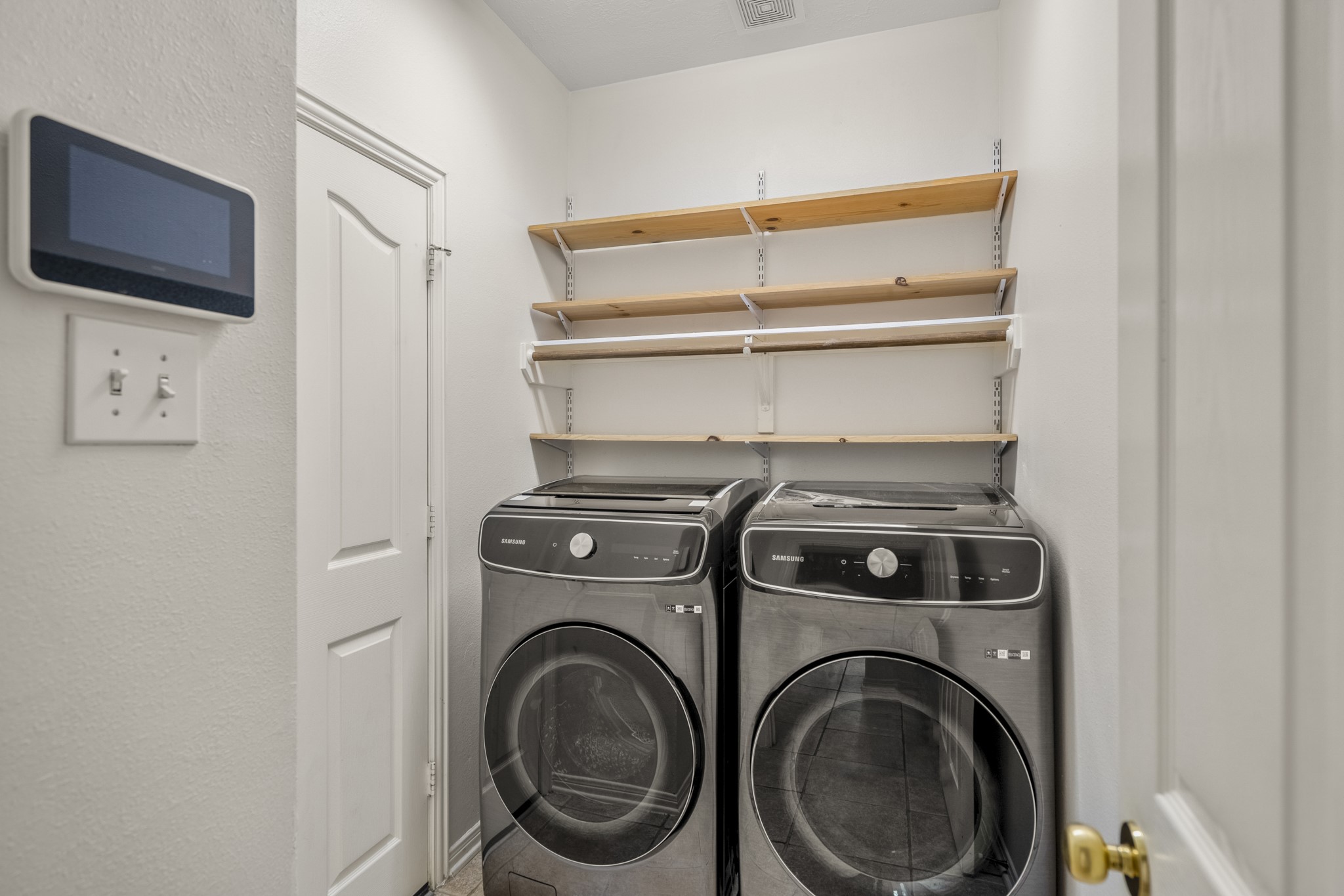 15 Heron Hollow Court Spring, TX 77382 - Photo 21 of 42 a utility room with dryer and washer