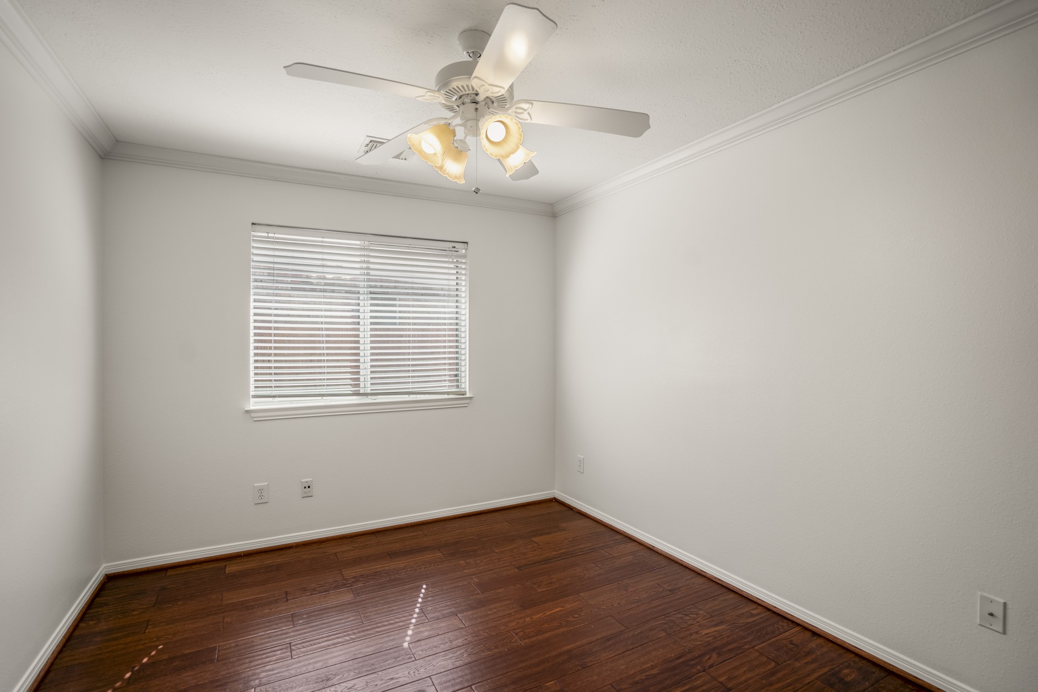 15 Heron Hollow Court Spring, TX 77382 - Photo 25 of 42 wooden floor in an empty room with a window