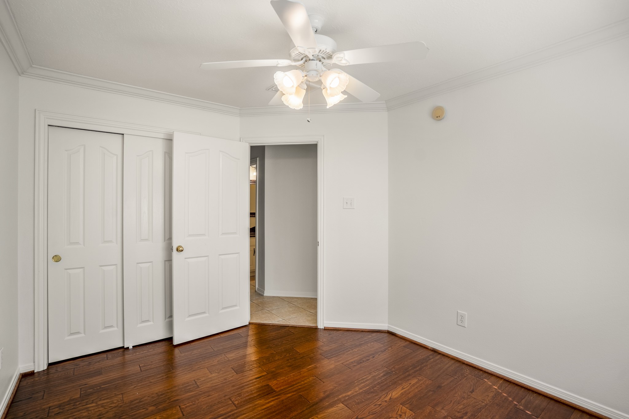 15 Heron Hollow Court Spring, TX 77382 - Photo 26 of 42 a view of an empty room with wooden floor