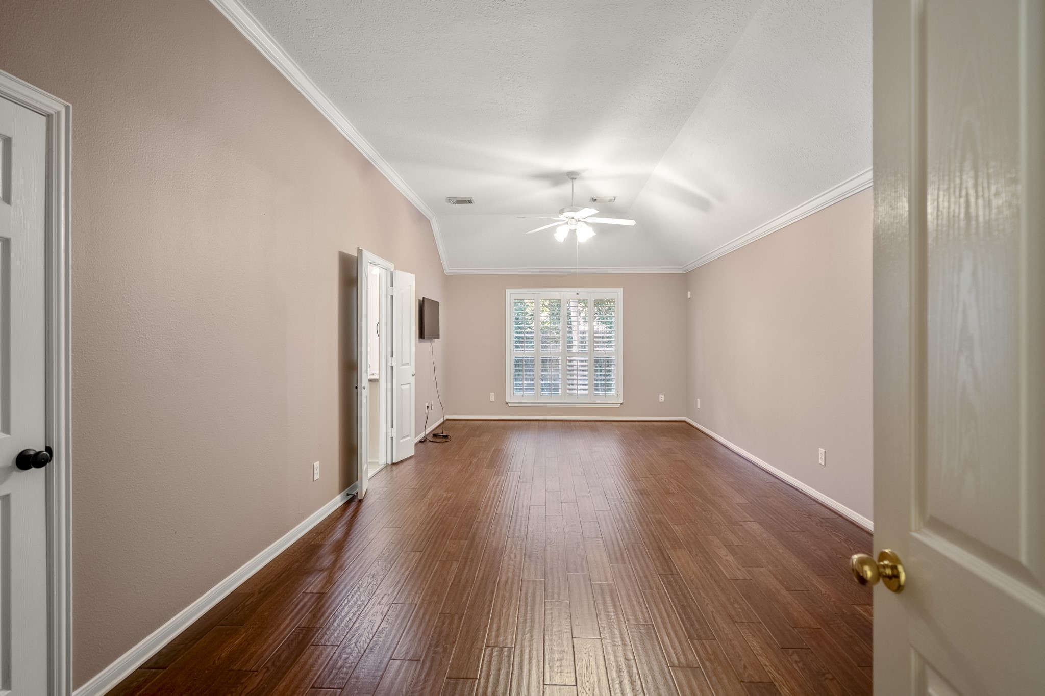 15 Heron Hollow Court Spring, TX 77382 - Photo 27 of 42 a view of an empty room with wooden floor and a window