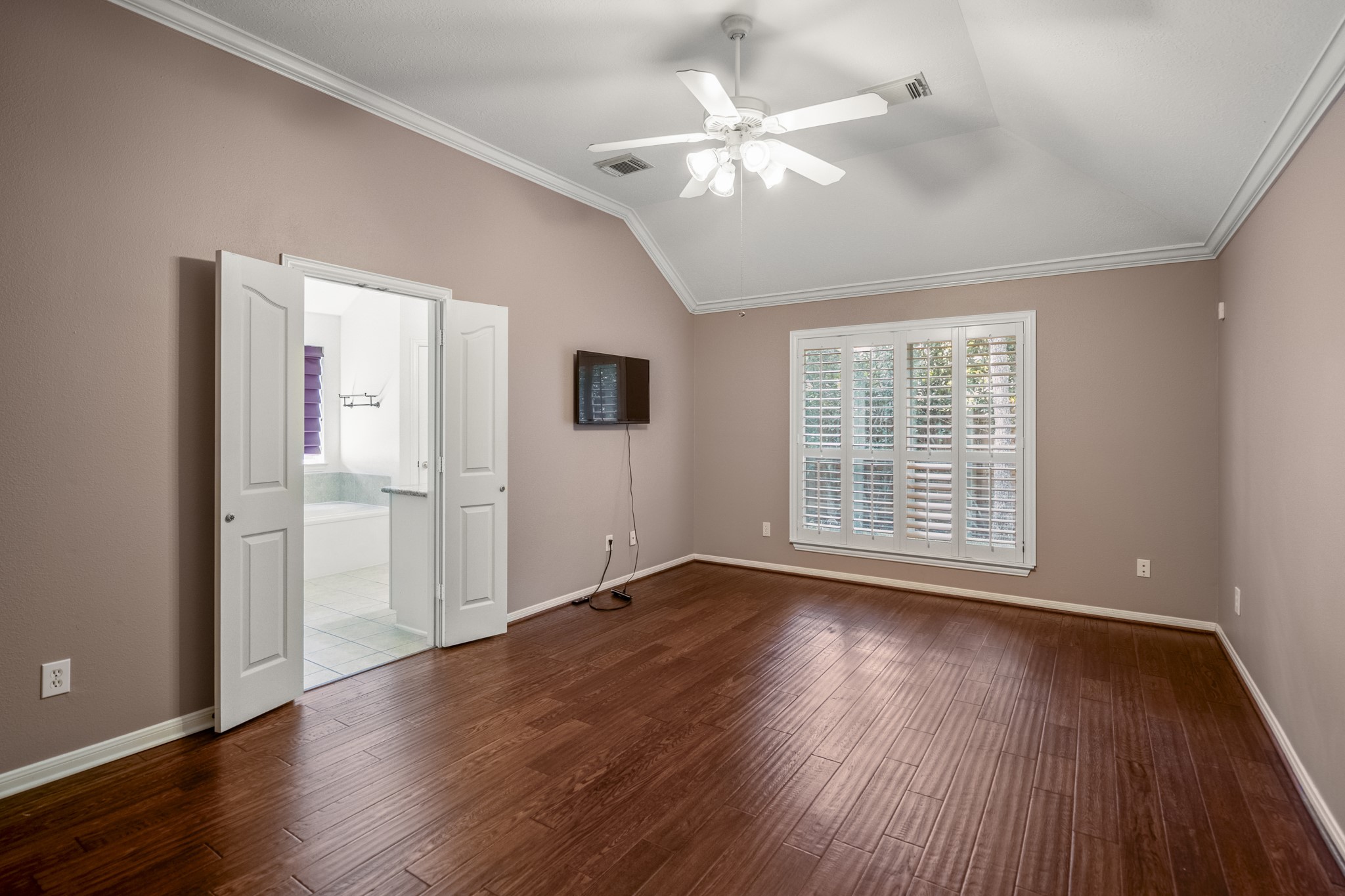 15 Heron Hollow Court Spring, TX 77382 - Photo 28 of 42 a view of an empty room with wooden floor and a window