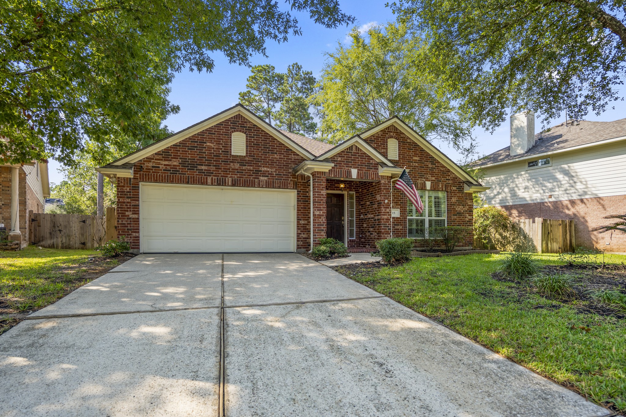 15 Heron Hollow Court Spring, TX 77382 - Photo 3 of 42 a front view of a house with yard and green space