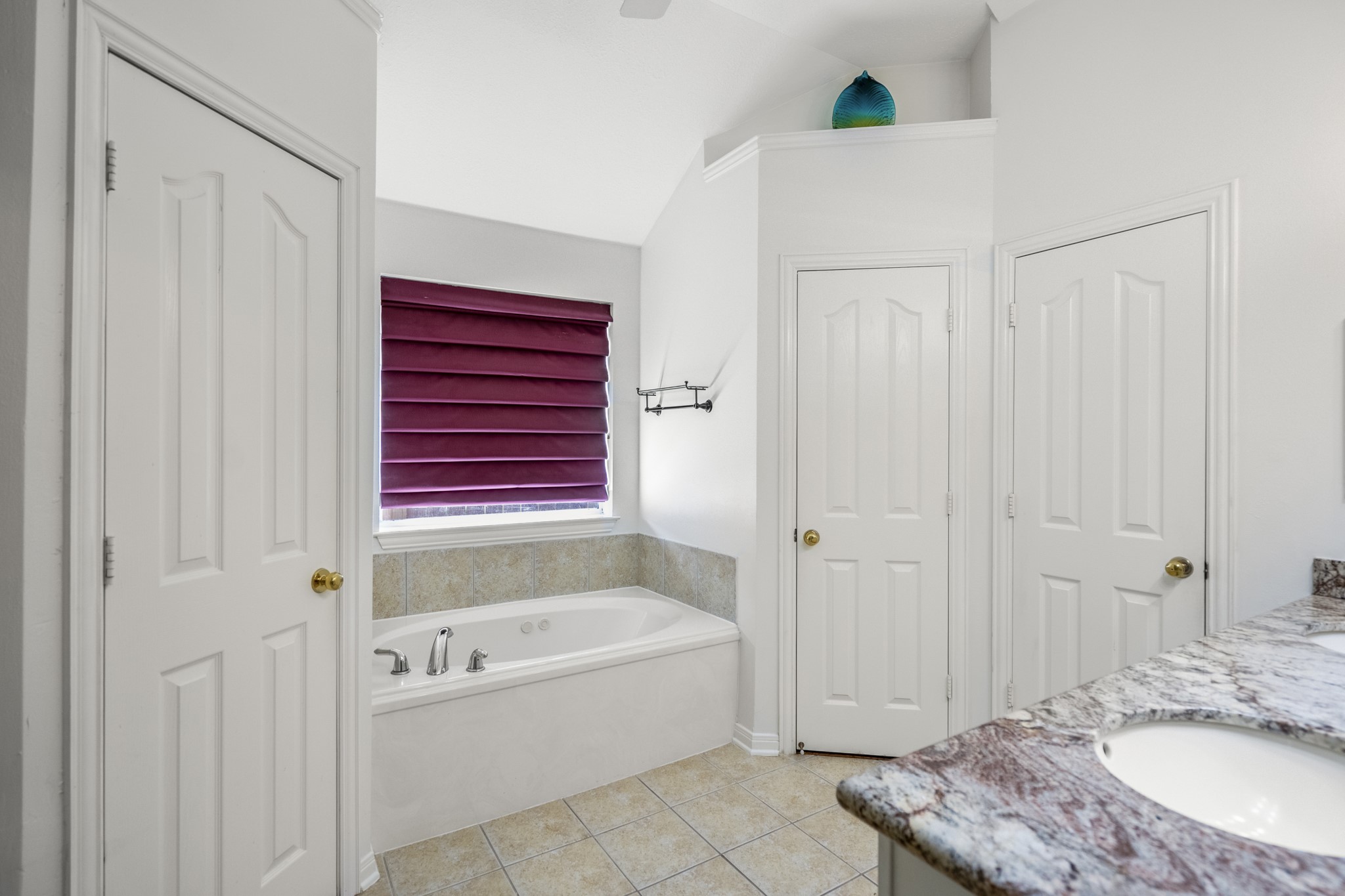 15 Heron Hollow Court Spring, TX 77382 - Photo 32 of 42 a bathroom with a granite countertop sink and a mirror