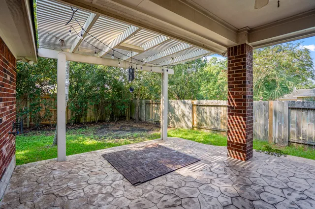 a view of a yard with a sink and garden