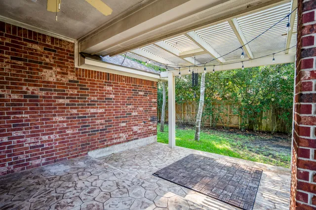 a backyard of a house with lots of green space
