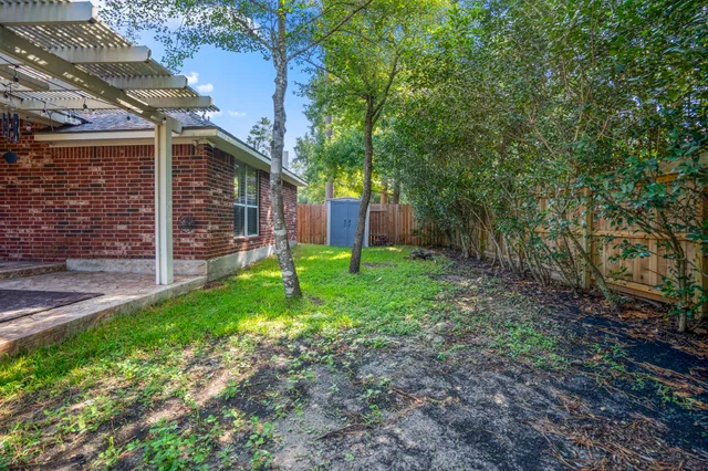 a view of a backyard with a garden
