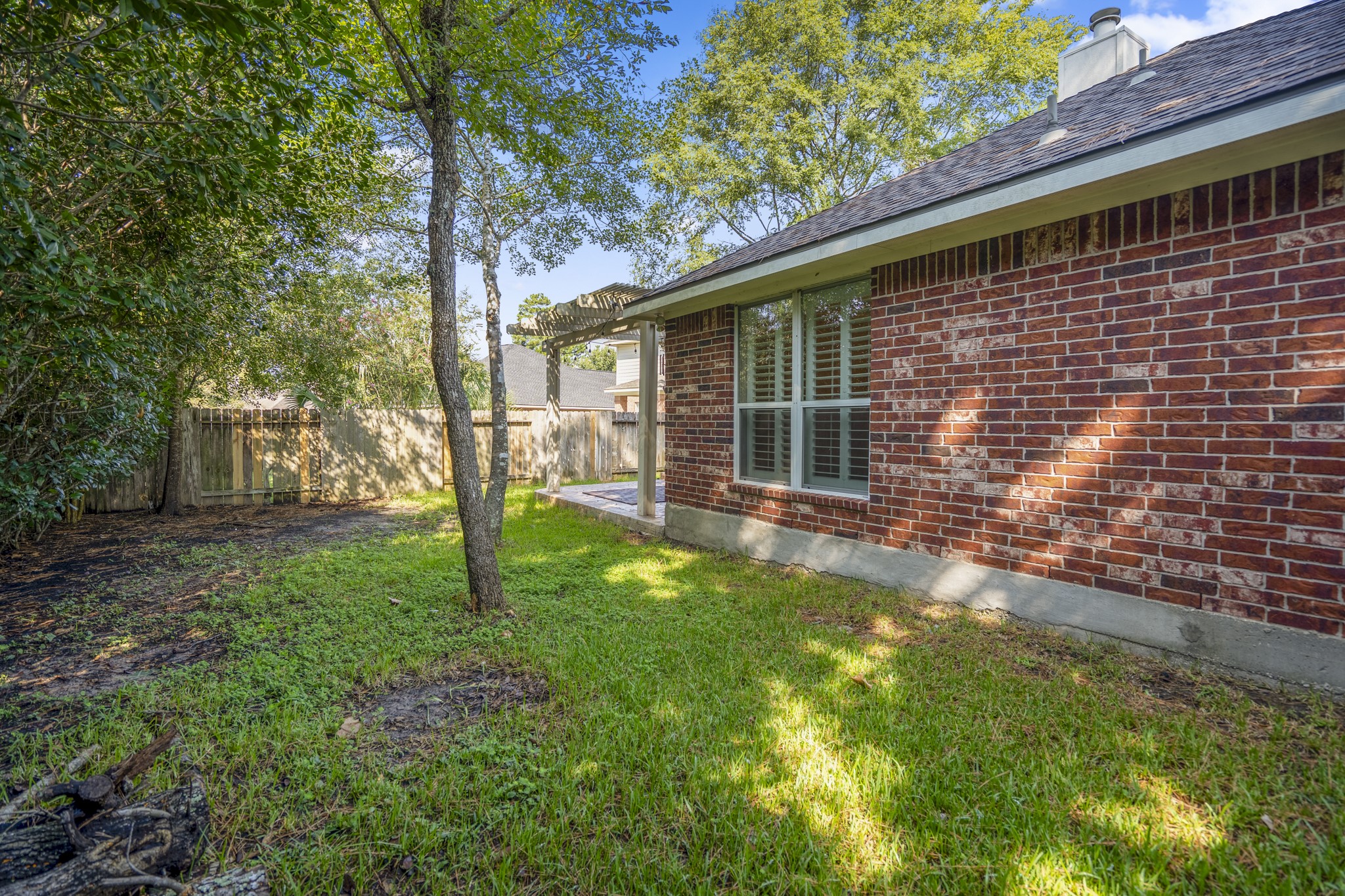 15 Heron Hollow Court Spring, TX 77382 - Photo 42 of 42 a backyard of a house with lots of green space