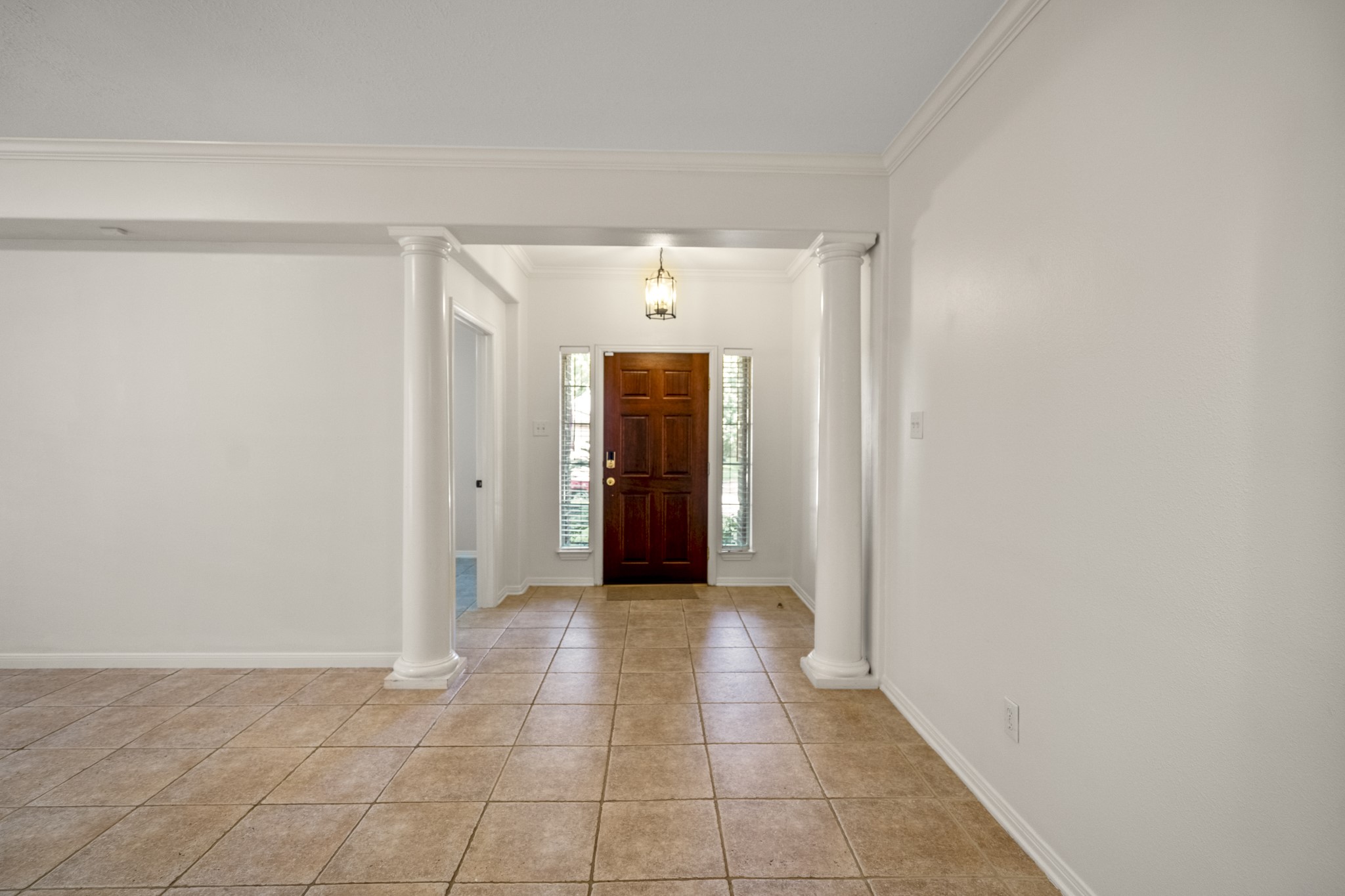15 Heron Hollow Court Spring, TX 77382 - Photo 6 of 42 a view of a hallway with wooden shelves