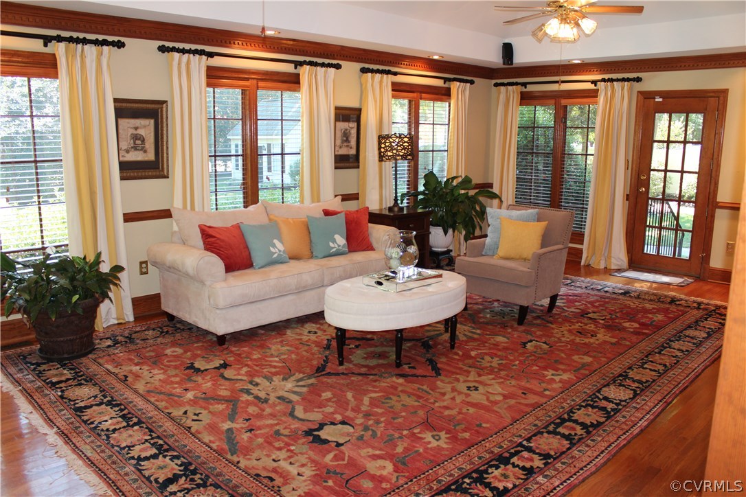 207 Rivers Bend Circle Chester, VA 23836 - Photo 11 of 36 a living room with furniture and a large window