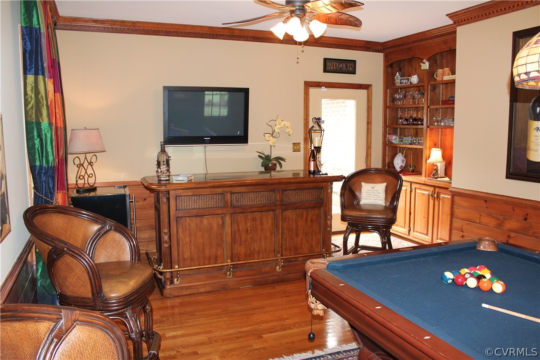 207 Rivers Bend Circle Chester, VA 23836 - Photo 14 of 36 a living room with furniture and a flat screen tv