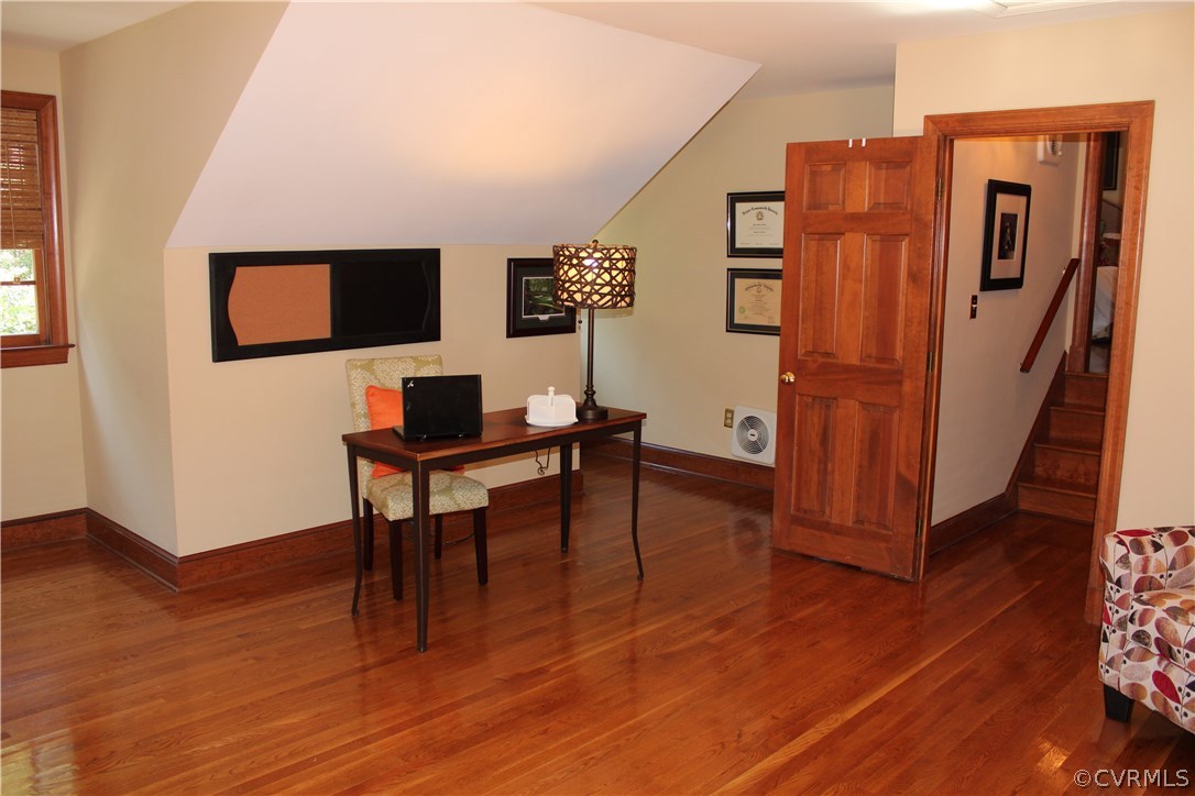 207 Rivers Bend Circle Chester, VA 23836 - Photo 24 of 36 a workspace with furniture and wooden floor