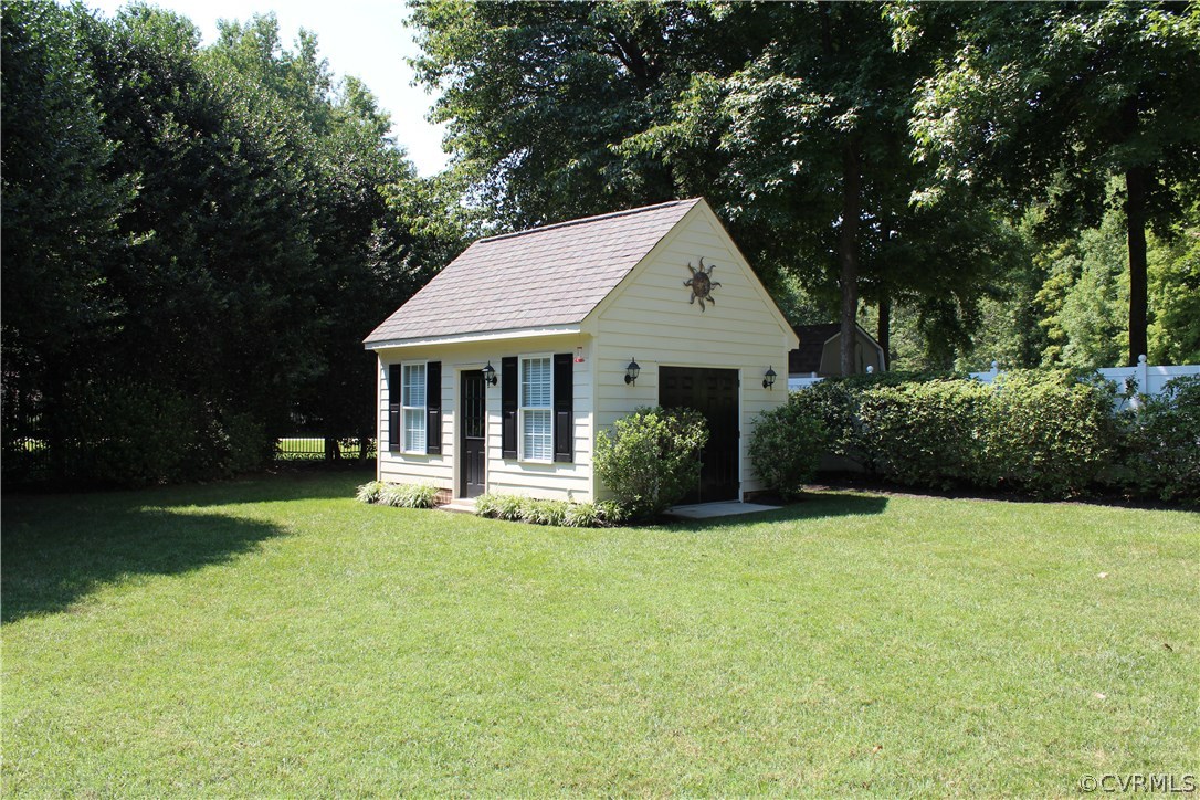 207 Rivers Bend Circle Chester, VA 23836 - Photo 30 of 36 a front view of a house with yard and green space