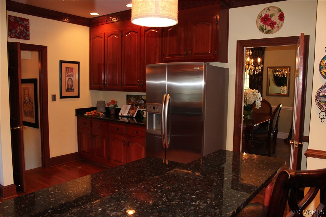 207 Rivers Bend Circle Chester, VA 23836 - Photo 8 of 36 a kitchen with stainless steel appliances granite countertop a refrigerator and a sink