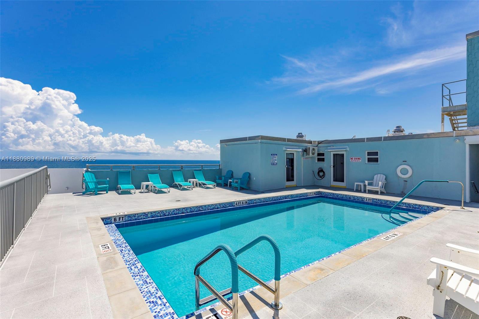 400 North Surf Road, Unit 903 Hollywood, FL 33019 - Photo 24 of 34 a room with a table and chairs