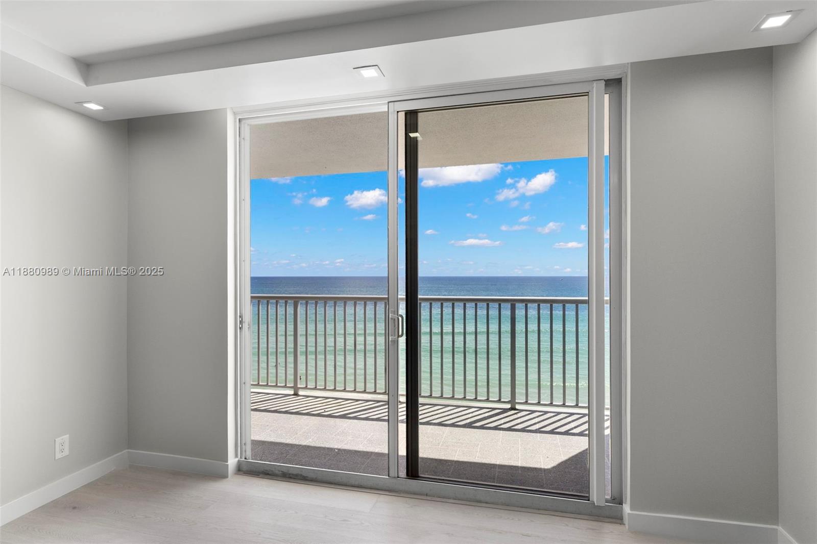 400 North Surf Road, Unit 903 Hollywood, FL 33019 - Photo 10 of 34 a view of a glass door and a window
