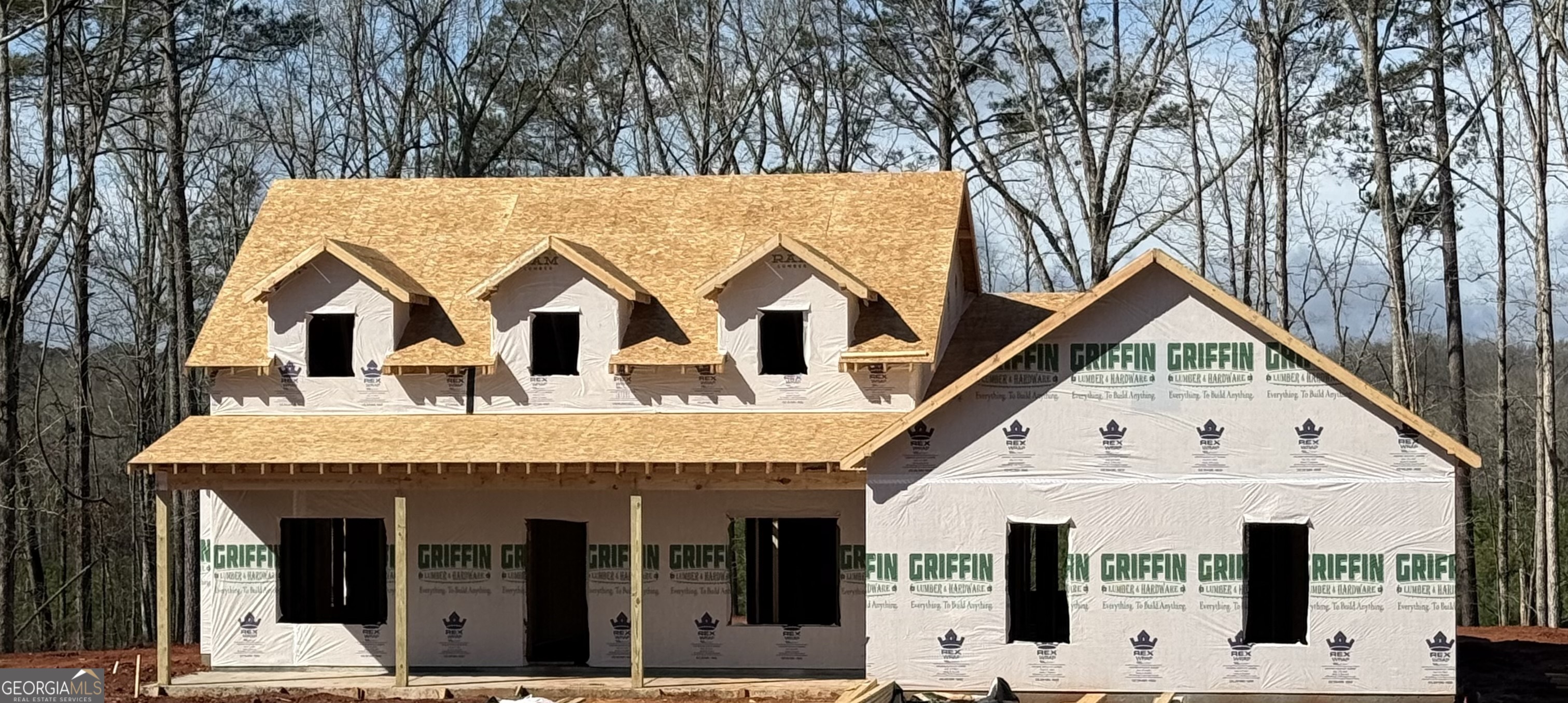 354 McKneely Road Milner, GA 30257 - Photo 1 of 1 a view of white house with large windows