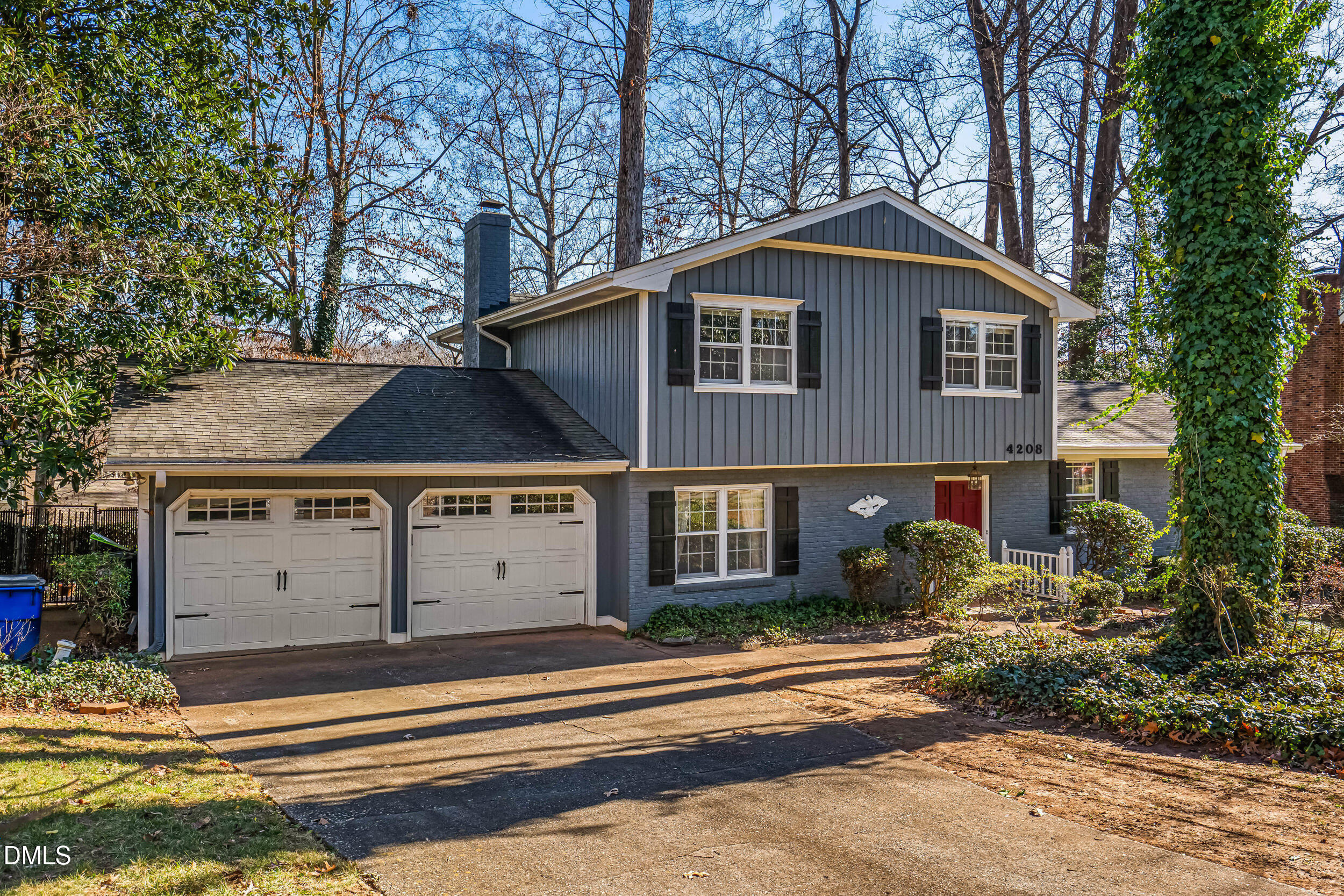 4208 Redington Drive Raleigh, NC 27609 - Photo 1 of 45 a front view of a house with a yard