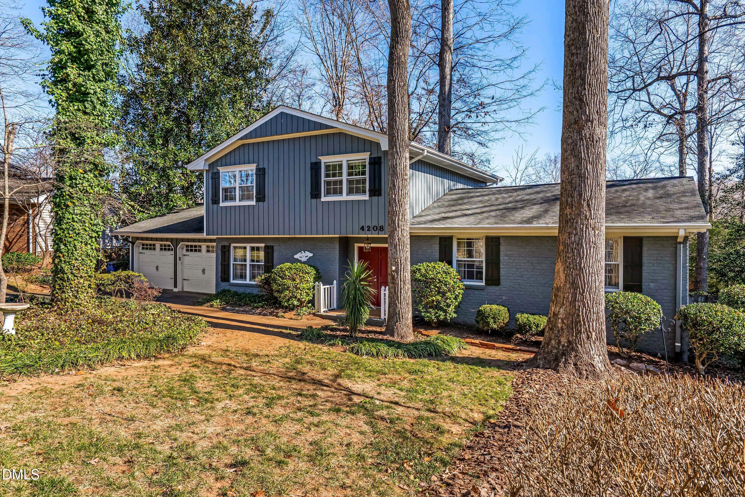 4208 Redington Drive Raleigh, NC 27609 - Photo 2 of 45 a front view of a house with patio