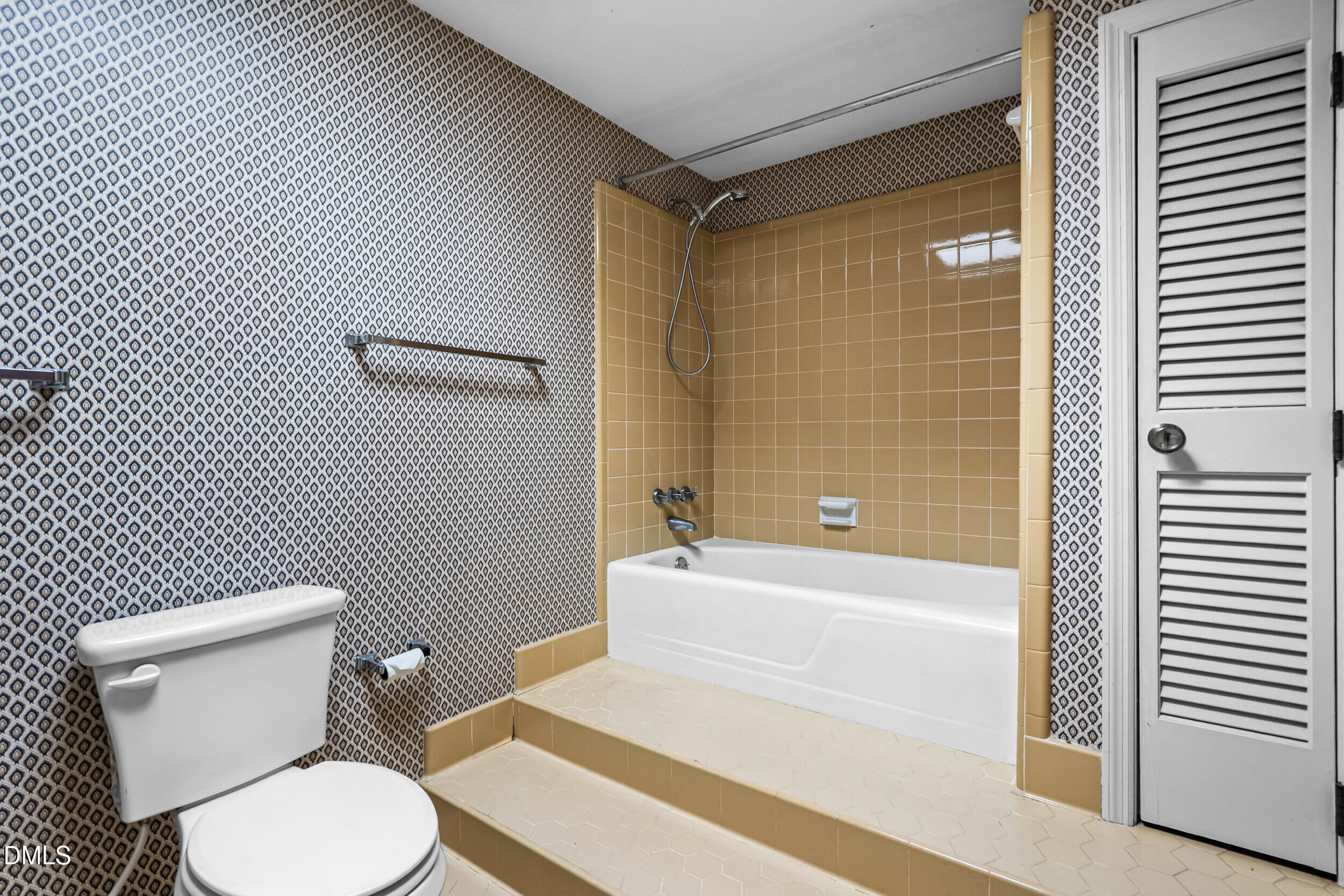 4208 Redington Drive Raleigh, NC 27609 - Photo 28 of 45 a white toilet sitting next to a bath tub