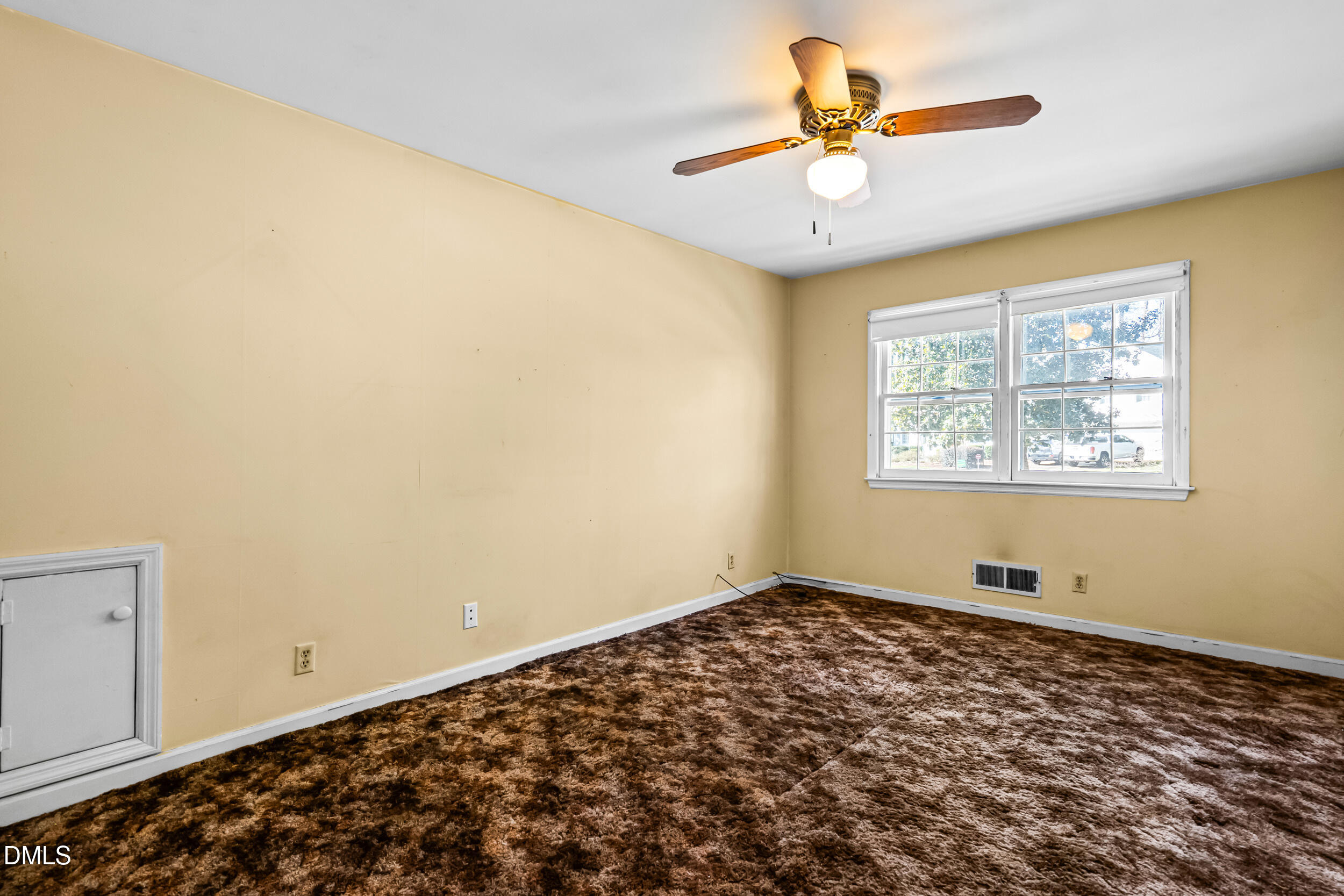 4208 Redington Drive Raleigh, NC 27609 - Photo 34 of 45 a view of a room with window and ceiling fan