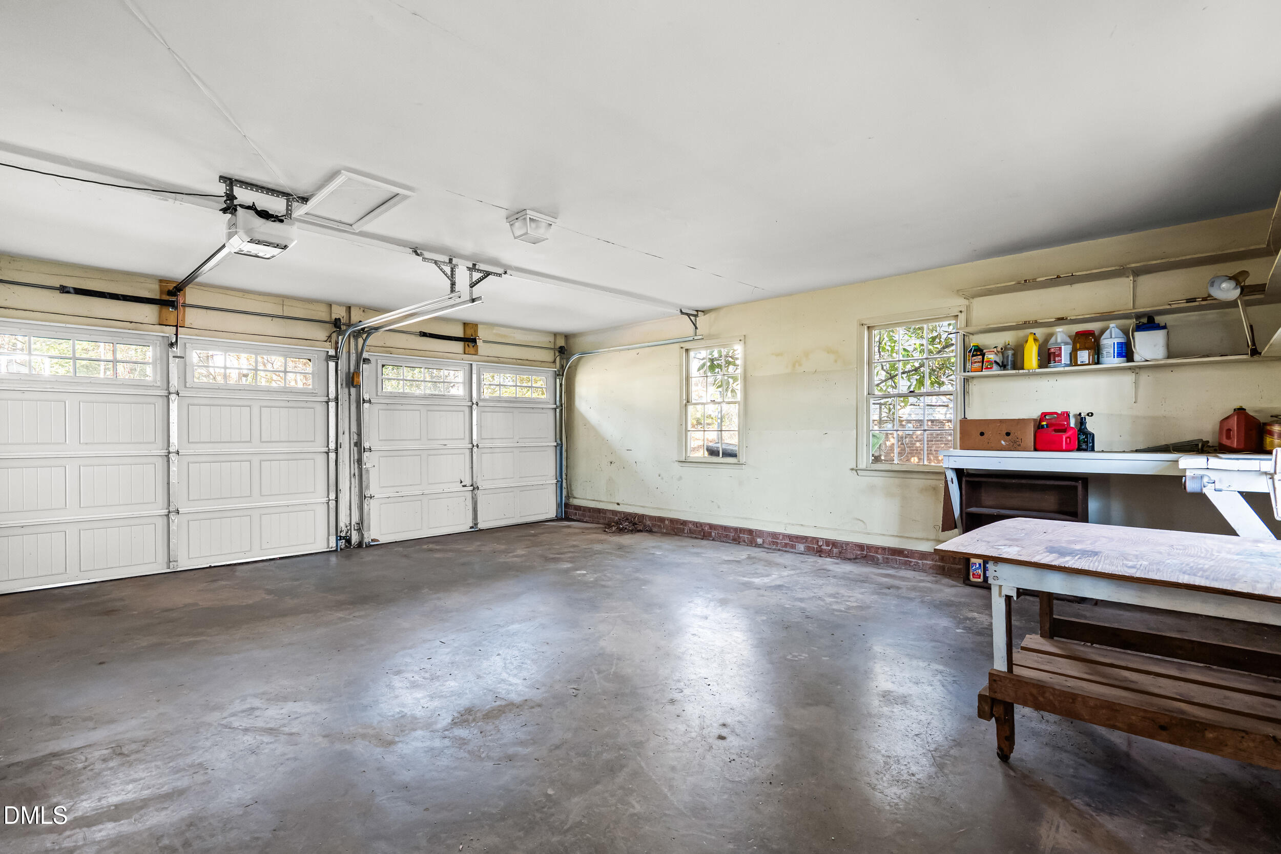 4208 Redington Drive Raleigh, NC 27609 - Photo 35 of 45 a view of a garage with furniture