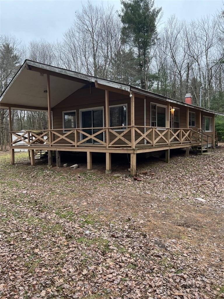 305 Cold Spring Road Monticello, NY 12701 - Photo 1 of 1 Covered side deck