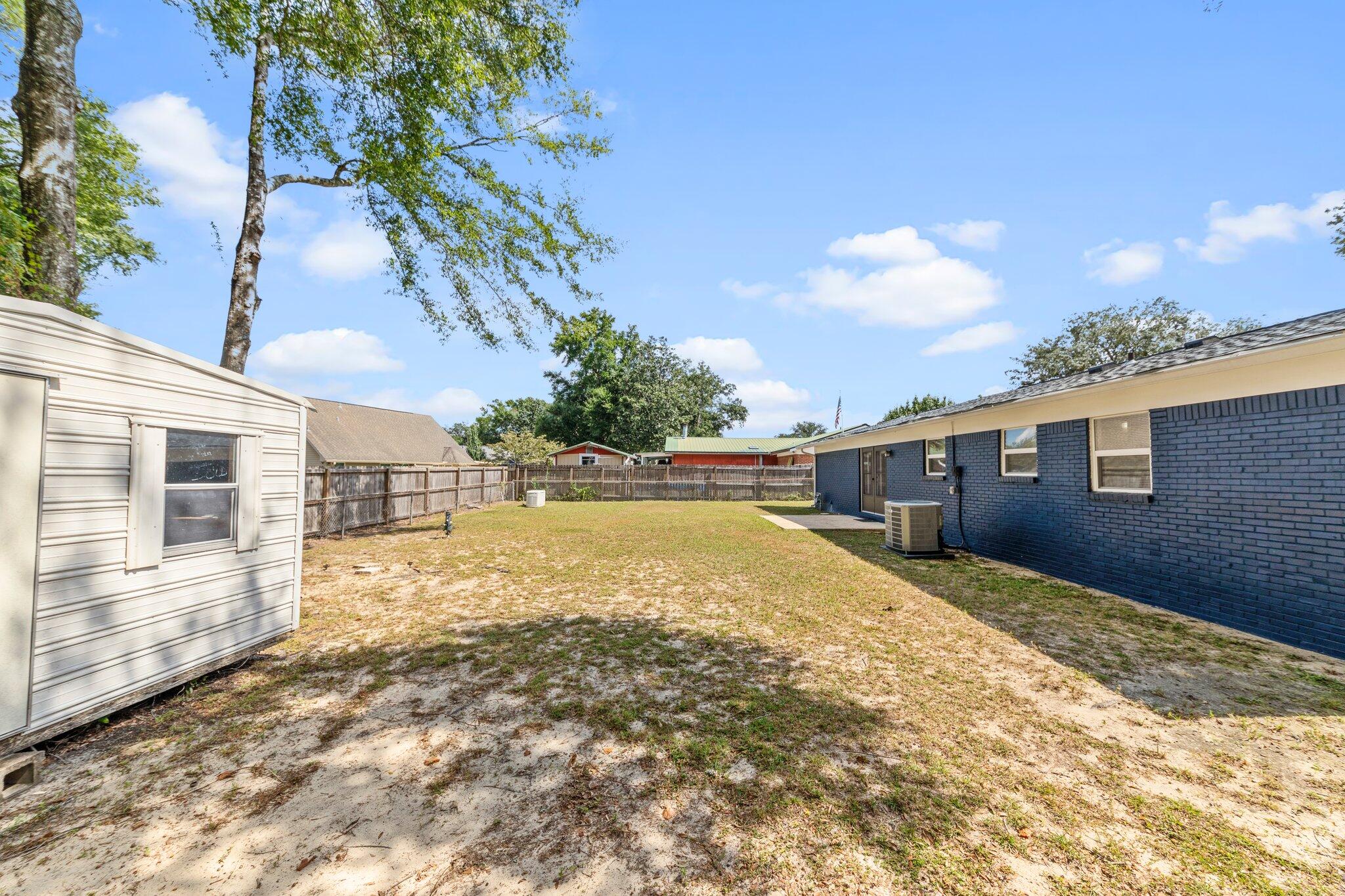 309 23rd Street Niceville, FL 32578 - Photo 30 of 33 a view of backyard of the house