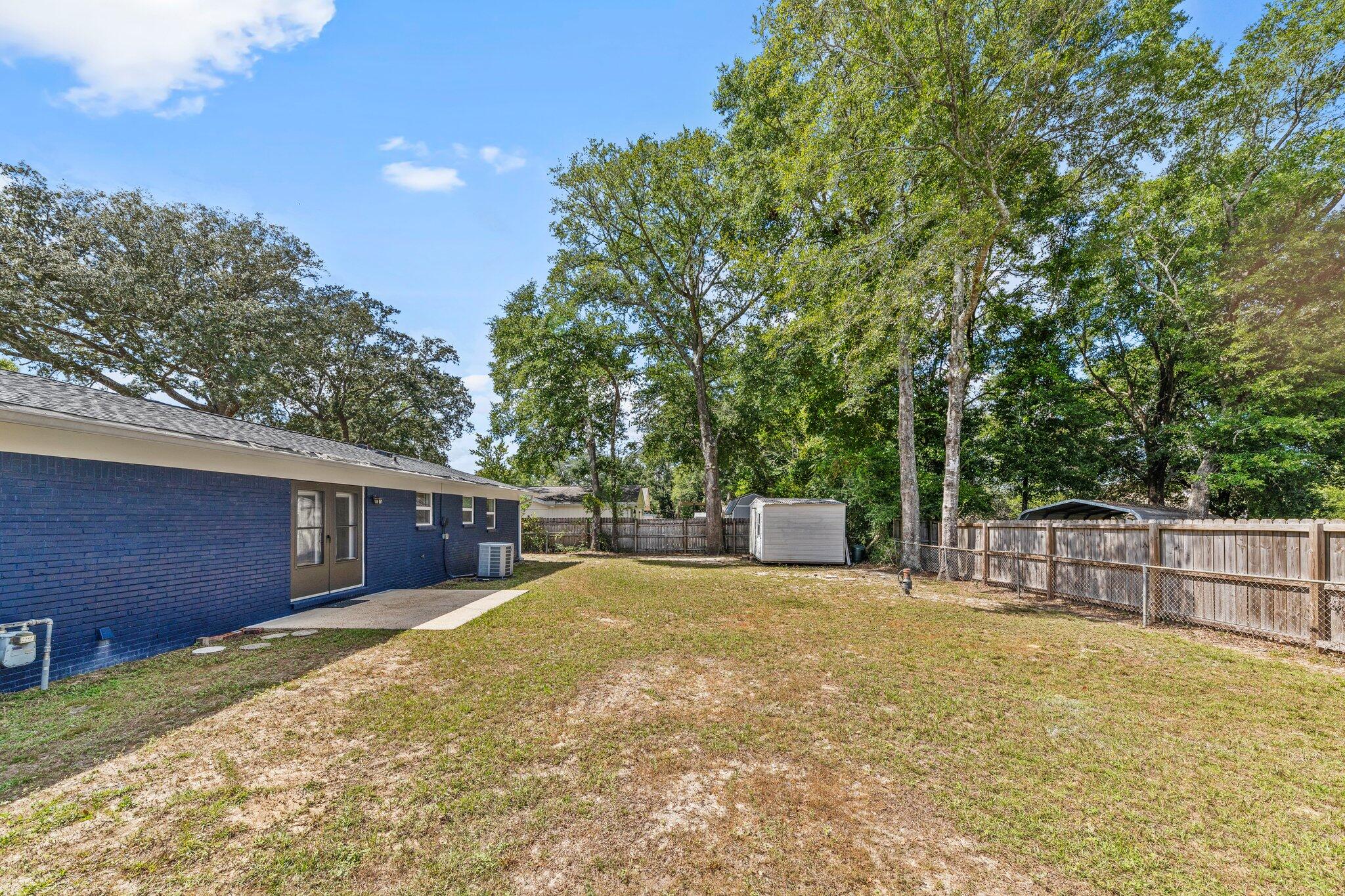 309 23rd Street Niceville, FL 32578 - Photo 31 of 33 a view of a house with a outdoor space