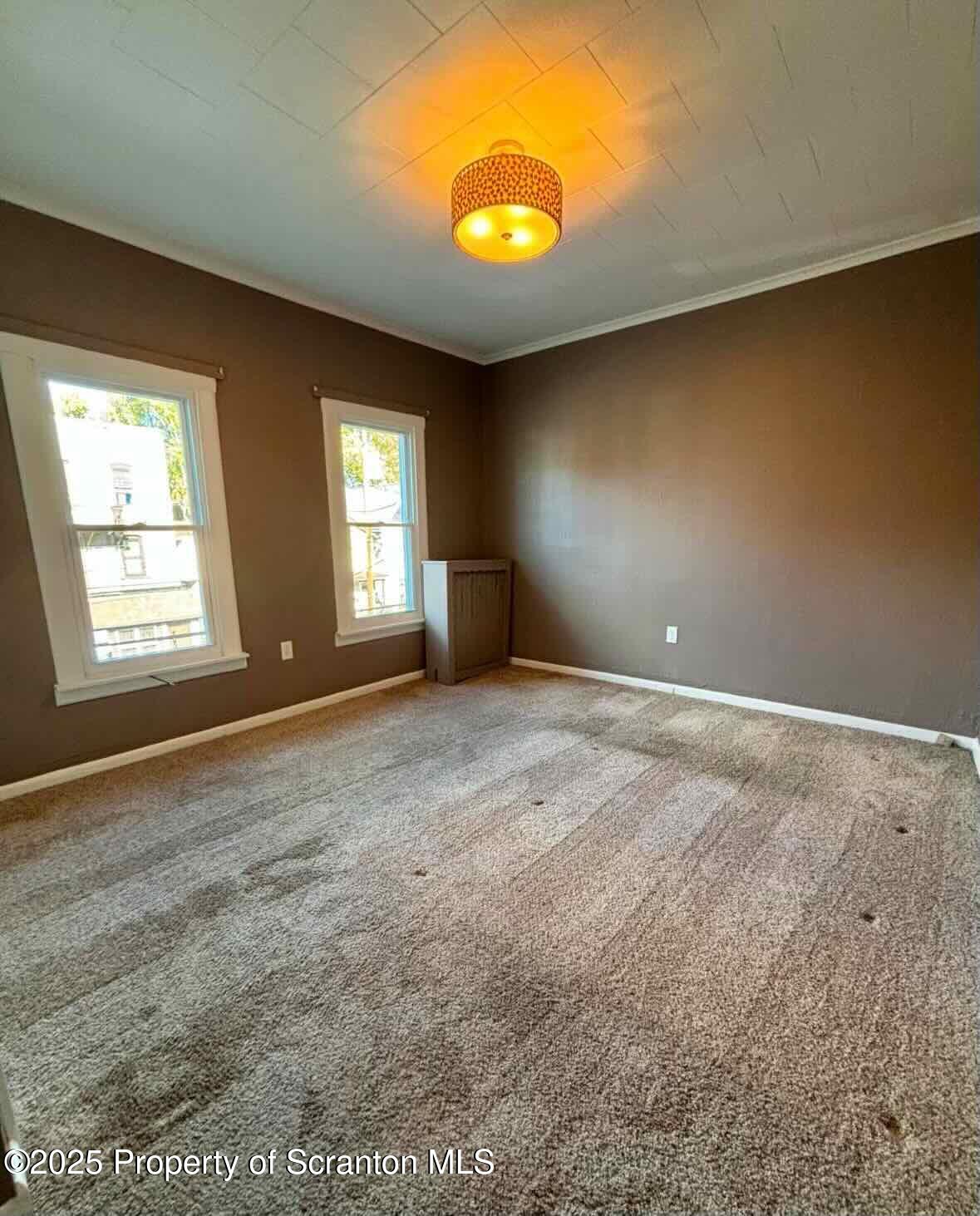 1406 Penn Avenue Scranton, PA 18509 - Photo 11 of 12 a view of an empty room with window and bathroom