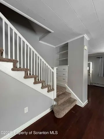a view of entryway with stairs