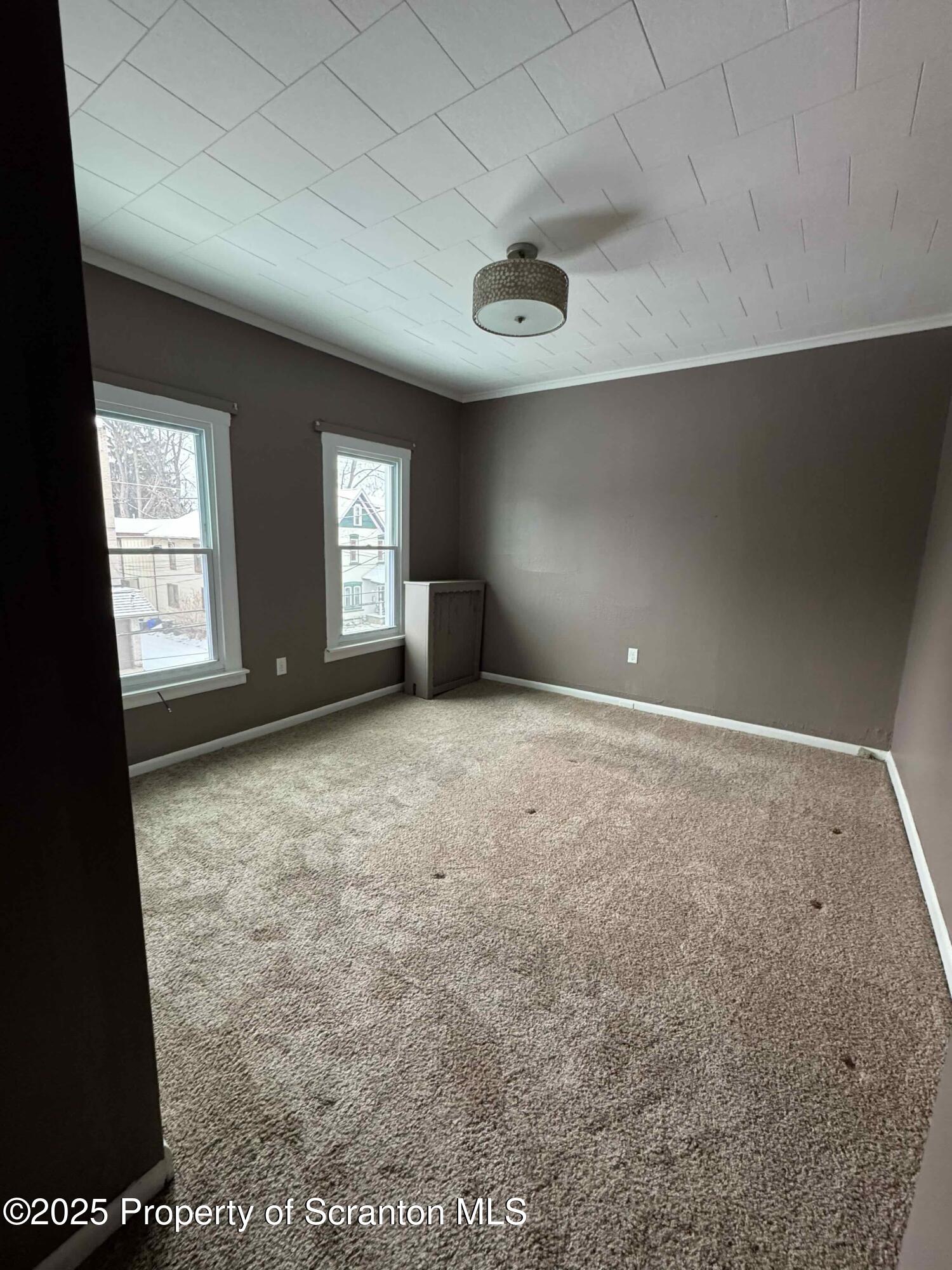 1406 Penn Avenue Scranton, PA 18509 - Photo 5 of 12 an empty room with windows