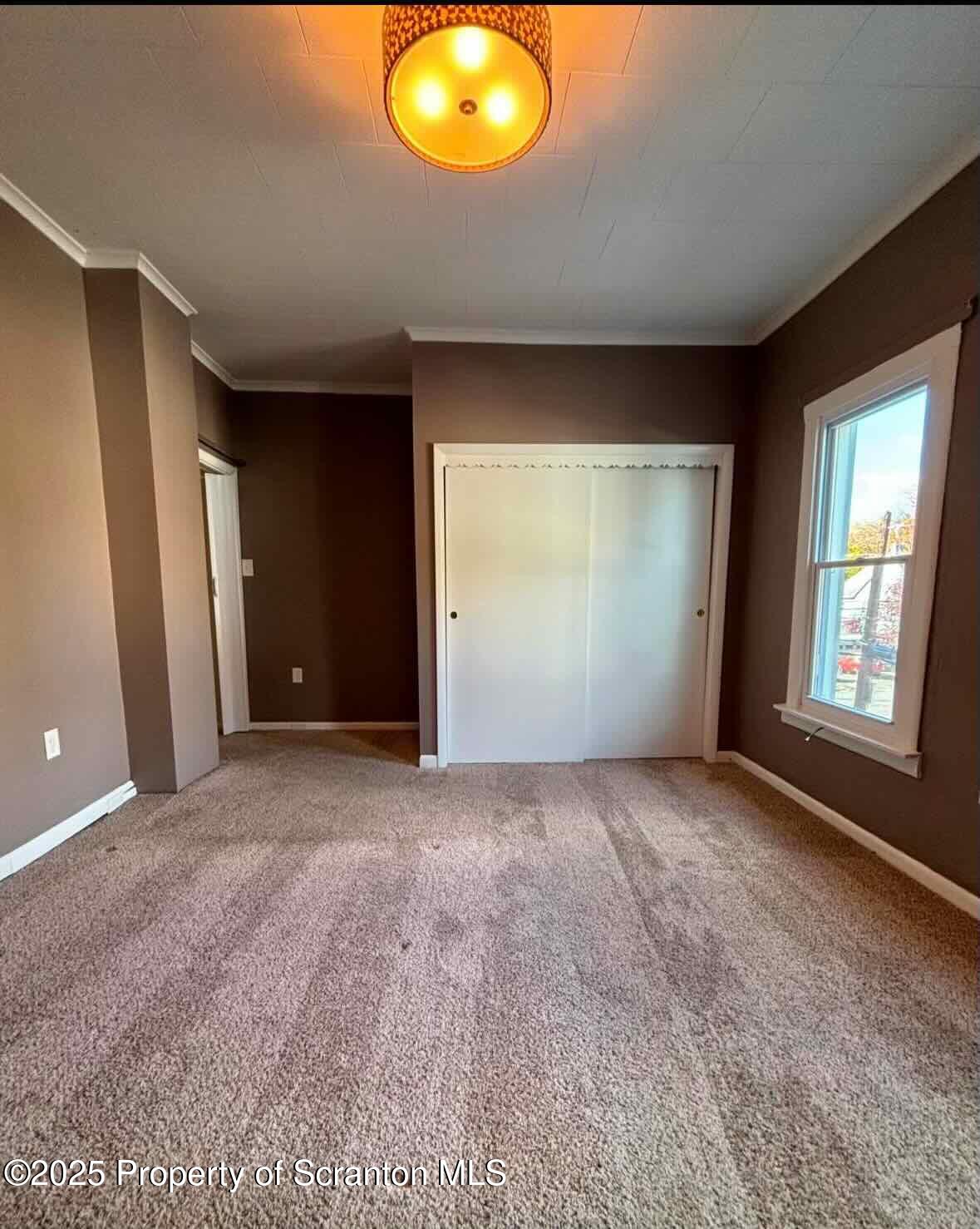 1406 Penn Avenue Scranton, PA 18509 - Photo 9 of 12 an empty room with windows