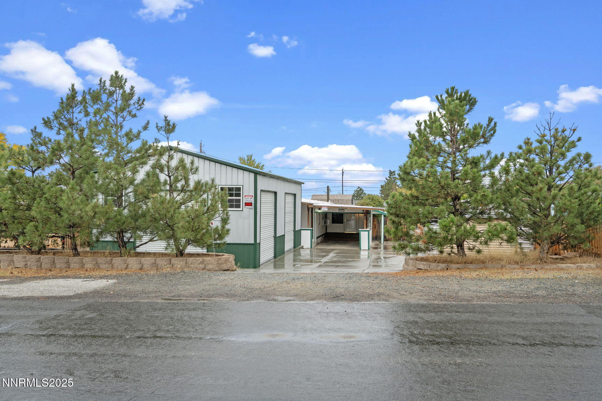 180 Staci Way Sun Valley, NV 89433 - Photo 1 of 71 a view of a house with a tree and a yard