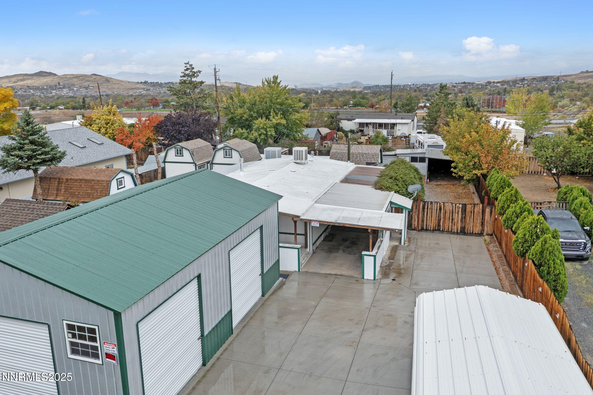 180 Staci Way Sun Valley, NV 89433 - Photo 12 of 71 an aerial view of a house with balcony and outdoor space