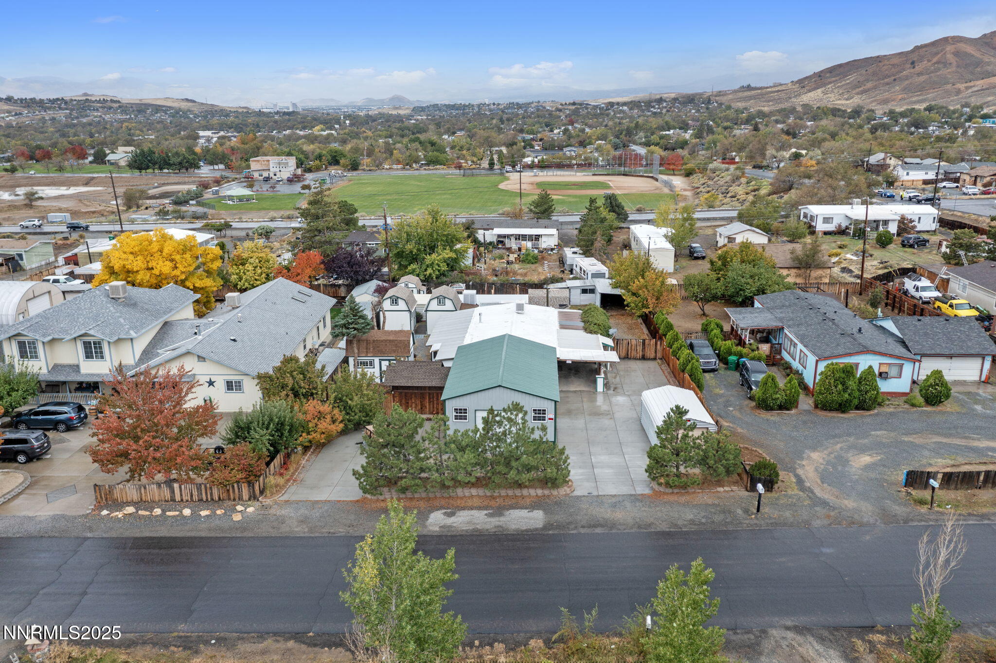 180 Staci Way Sun Valley, NV 89433 - Photo 14 of 71 an aerial view of multiple house